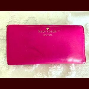 Well loved Kate Spade got pink wallet.